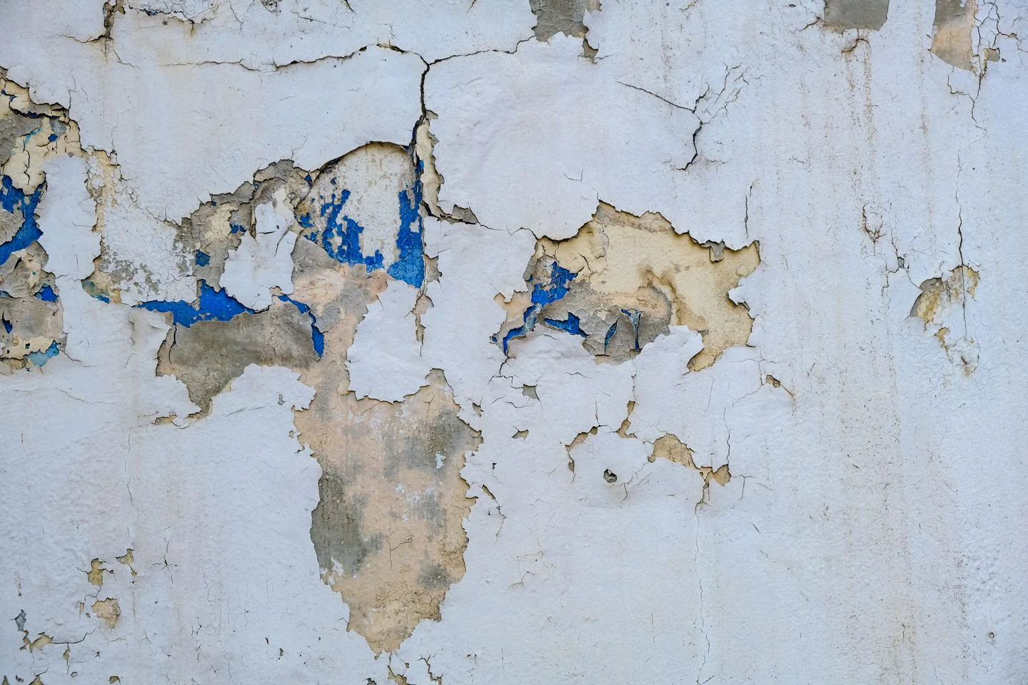 Wall with peeling paint.