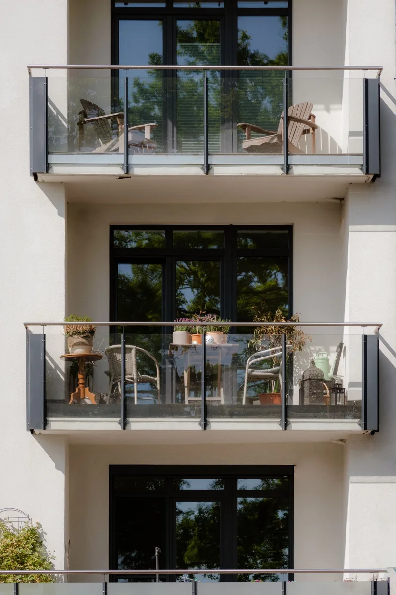 Apartment-building facade with balconies.