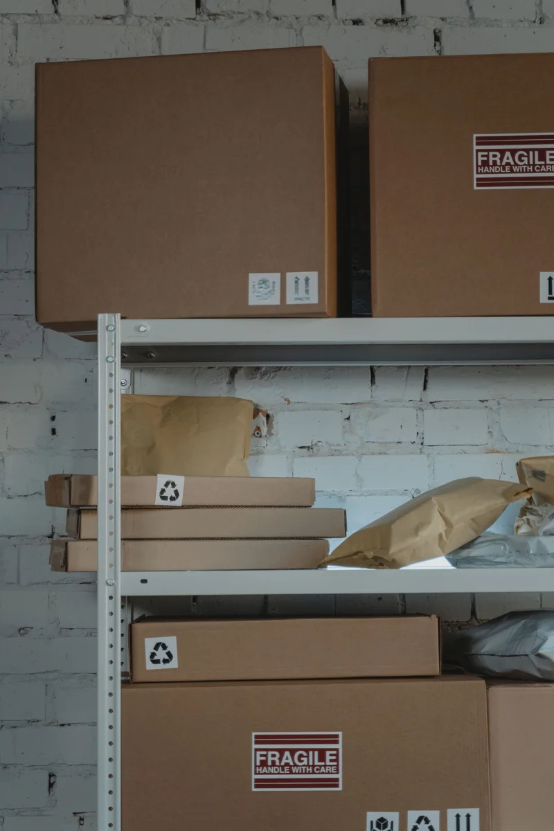 Cardboard boxes on storage shelves